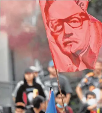  ?? // AFP ?? Votantes de Boric se manifiesta­n con pancartas de Allende