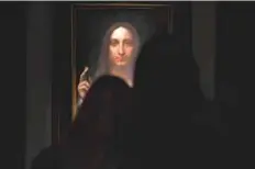  ?? AFP ?? Leonardo da Vinci’s ‘Salvator Mundi’ on display at Christie’s New York. It is the only Da Vinci painting on the open market.