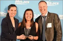  ?? Special to The Daily Courier ?? UBC Okanagan’s Emily Giroux, 24, centre, won the Mitacs Award for Outstandin­g Innovation by a Master’s Student. She was congratula­ted at the awards ceremony in Ottawa by federal Minister of Science and Sport Kirsty Duncan and Kelowna-Lake Country MP Stephen Fuhr.