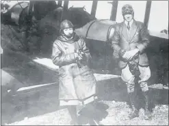  ??  ?? Dannevirke 15-year-old Violet Hibbard in July 1920 with Captain Russell as the first passenger on a flight to Palmerston North.