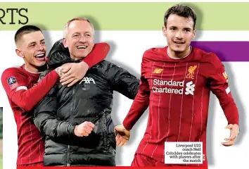  ??  ?? Liverpool U23 coach Neil Critchley celebrates with players after the match