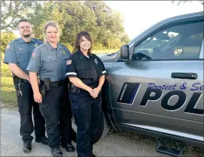  ?? SALLY CARROLL/MCDONALD COUNTY PRESS ?? Goodman Police Chief Curt Drake (left) and part-time reserve officers Michelle Wilson and Lorie Howard serve Goodman neighbors. Not pictured is Officer Joe David.