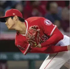  ?? AP PHOTO/KYUSUNG GONG ?? In this June 6 file photo Los Angeles Angels starting pitcher Shohei Ohtani watches a pitch during the third inning of a baseball game against the Kansas City Royals in Anaheim.