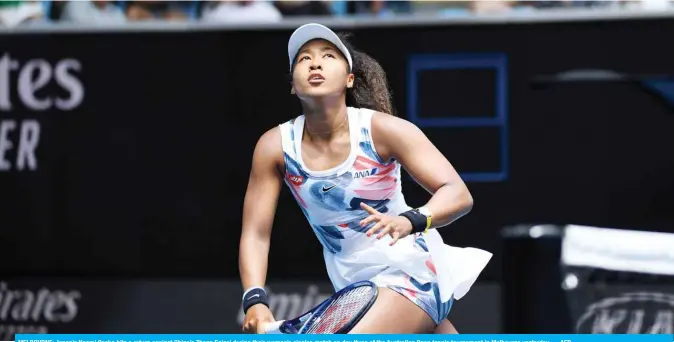  ?? — AFP ?? MELBOURNE: Japan’s Naomi Osaka hits a return against China’s Zheng Saisai during their women’s singles match on day three of the Australian Open tennis tournament in Melbourne yesterday.