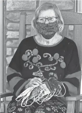  ?? FRED SQUILLANTE/USA TODAY NETWORK ?? Miriam Looker, a 95-year-old quilt-maker, has made about 3,000 reusable face masks for the community with the help of friends at Walnut Crossing senior living community in Marysville, Ohio.