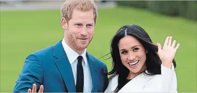  ?? EDDIE MULHOLLAND THE ASSOCIATED PRESS ?? Britain's Prince Harry, left, and Meghan
Markle will wed Saturday, May 19.