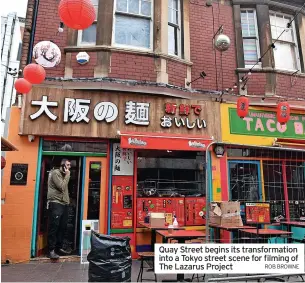  ?? ROB BROWNE ?? Quay Street begins its transforma­tion into a Tokyo street scene for filming of The Lazarus Project