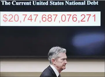  ?? Olivier Douliery TNS ?? NEW FED Chairman Jerome H. Powell, testifying before the House Financial Services Committee for the first time, suggested Tuesday that the central bank could raise its key interest rate faster than anticipate­d.