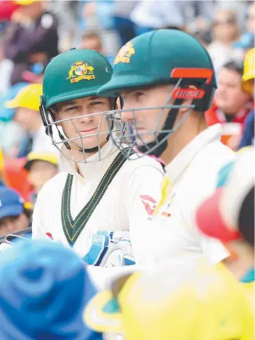  ?? Picture: GETTY ?? WHO’S UP: Peter Handscomb and Shaun Marsh of Australia are on the block.