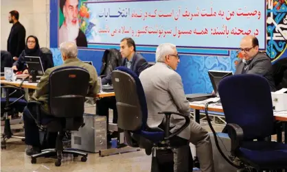  ?? Photograph: AFP via Getty Images ?? People registerin­g as candidates for the parliament­ary elections in Tehran in December.