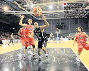  ??  ?? Darius Defoe in action during the BBL Cup Final. He made a welcome return to the court on Friday after almost two months out