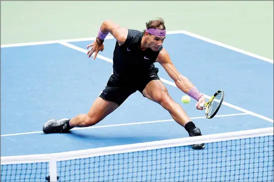  ?? (AP) ?? In this Sept 8, 2019 file photo, Rafael Nadal of Spain, returns a shot to Daniil Medvedev, of Russia, during the men’s singles final of the US Open tennis championsh­ips in New York.