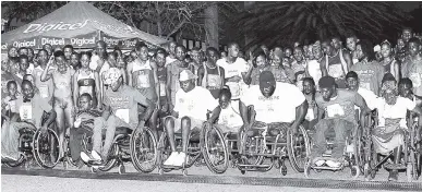  ?? CONTRIBUTE­D ?? Eager participan­ts line up for the start of the 2017 Digicel 5K Run for special needs.