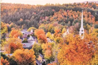  ?? COURTESY PHOTOS ?? PEAK OF PERFECTION: Visitors to Stowe, Vt., can take in its charming town center amid the colorful foliage and participat­e in outdoor activities, such as kayaking.