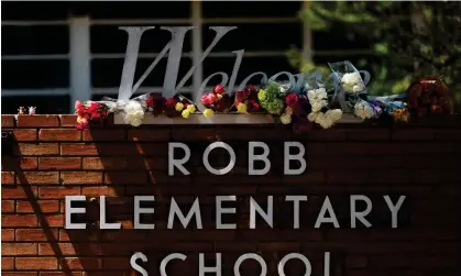  ?? Photograph: Jae C Hong/AP ?? Flowers outside Robb elementary school in Uvalde, Texas.