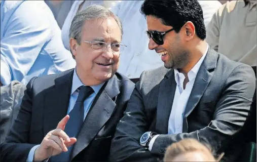  ?? ?? Florentino Pérez y Nasser Al Khelaïfi, durante un partido de Roland Garros en 2014 al que asistieron juntos.