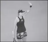  ?? Associated Press ?? Elena Rybakina waves after defeating Victoria Azarenka in their semifinal match at the Australian Open on Thursday in Melbourne, Australia. Rybakina plays Aryna Sablenka, today, for the title.