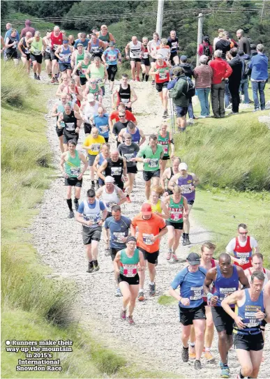  ??  ?? Runners make their way up the mountain in 2015’s Internatio­nal Snowdon Race