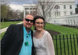  ?? COURTESY OF JEFF WALKER VIA AP ?? Jeff Walker and his daughter Harleigh of Auburn, Ala., stand outside the White House on March 31, where they were guests for Transgende­r Day of Visibility.