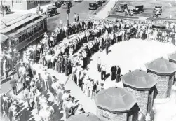  ?? ?? Crowds line up at Comiskey Park on the morning of July 3, 1933, to buy bleacher tickets for “The Game of the Century” between American and National league All-Star teams.