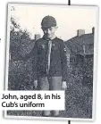  ??  ?? John, aged 8, in his Cub’s uniform