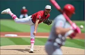  ?? DAVID DERMER — THE ASSOCIATED PRESS ?? Guardians starting pitcher Tanner Bibee delivers to the Angels’ Hunter Renfroe in 2023.