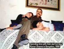  ??  ?? Spending time with their dad Col Ajay Kumar Sharma in Bengaluru, 1998