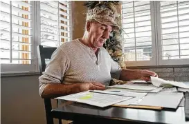  ?? Zbigniew Bzdak / Chicago Tribune ?? George Sternisha, at his home in Crest Hill, Ill., is helping fulfill his mother’s longtime wish to bury her brother, Navy Fireman 1st Class Michael Galajdik, who was killed at Pearl Harbor. His funeral is scheduled for Saturday.