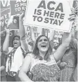  ?? JIM LO SCALZO, EPA ?? People cheer the Obamacare ruling in Washington, D. C., on Thursday.