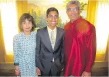  ??  ?? Janaka Ruwanpura, U of C vice-provost, internatio­nal, right, his wife Senani and son, Seniru, were among the hundreds of guests at the Immigrants of Distinctio­n Award Gala at The Westin Calgary.