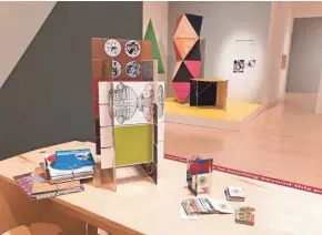  ?? SUBMITTED PHOTO ?? Guests are invited to try their hand at building a house of cards in the "Serious Play" exhibition at the Milwaukee Art Museum.