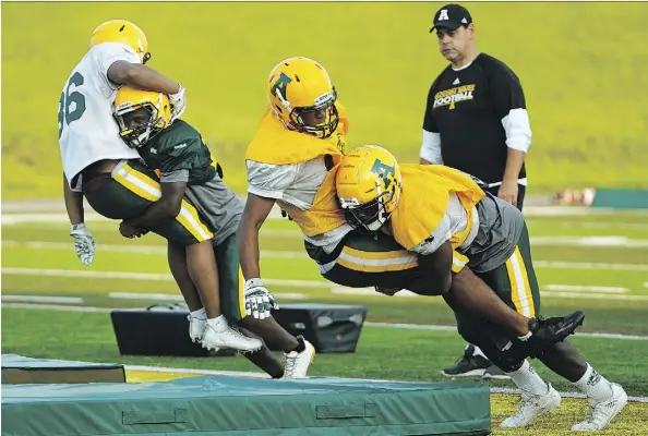  ?? LARRY WONG ?? Golden Bears head coach Chris Morris praised the team’s spirit during practice this week ahead of their home opener on Friday against the Regina Rams. The Bears are coming off a 42-0 loss in which quarterbac­k Brad Baker left with an injury. He is expected to play Friday.