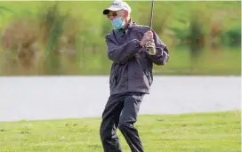  ??  ?? Right - Peter Brown watches his ball fly up the seventh tee in crisp conditions on Saturday at the Drouin Country Club.