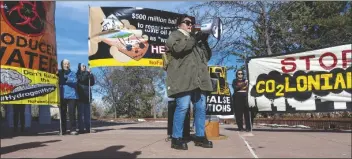  ?? EDDIE MOORE/AP ?? JULIA BERNAL, WITH PUEBLO ACTION ALLIANCE, speaks at a protest against an initiative by Gov. Michelle Lujan Grisham to develop a strategic new source of water, buying treated water that is the byproduct of oil and natural gas drilling, then treating it and selling it back to industry. Around 35 people attended the rally included speakers by Wild Earth Guardians and No False Solutions outside the State Capitol, in Santa Fe, N.M., on Monday.