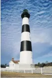  ?? CYNDY HOLDA/NATIONAL PARK SERVICE ?? The Bodie Island Lighthouse underwent a $5-million makeover and was opened to the public in April for the first time in its 141-year history.