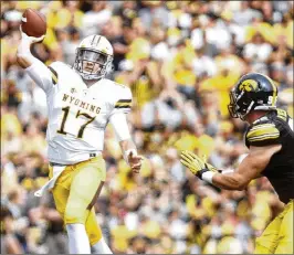  ?? MATTHEW HOLST / GETTY IMAGES ?? Wyoming’s Josh Allen possesses the strongest arm of the QBs likely to go in the first round, but he also lacks accuracy.