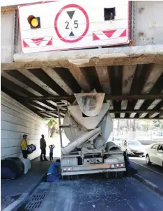  ??  ?? The railway bridge crossing in Muizenberg is notorious for crashes because road users often underestim­ate the height of their vehicles when driving under the bridge.