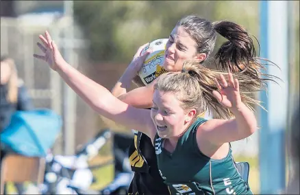  ?? Photo: Bruce Povey ?? Rochester’s Shannen Keath took no prisoners, grabbing the ball from an Echuca opponent.