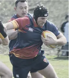  ?? ?? Johnathan Hamilton playing for Borough v Derby. Photos: David Lowndes