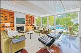  ??  ?? THE MIDCENTURY home in Beverly Hills was owned by the singer for about six years. She got $2.65 million for it.