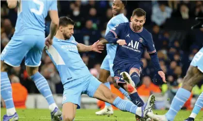  ?? ?? Manchester City’s Rúben Dias blocks a shot by Lionel Messi of PSG last November. Photograph: John Berry/Getty Images