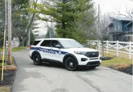  ?? MICHAEL CONROY/AP ?? A police vehicle stands Friday in the vicinity of former Vice President Mike Pence’s Indiana home. The FBI searched the home as part of a classified records probe.