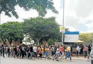  ?? / KELETSO MKHWANAZI ?? TUT students protest over unpaid monthly allowances and poor student accommodat­ion.