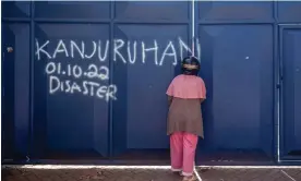  ?? Photograph: Juni Kriswanto/AFP/Getty Images ?? A woman visits Kanjuruhan stadium, the scene of the deadly stampede, in Malang, Indonesia, on 4 October, 2022.