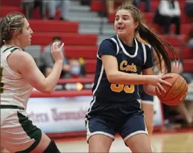  ?? Emily Matthews/Post-Gazette ?? Shenango’s Kylee Rubin looks to pass the ball against Seton LaSalle. Shenango won, 59-53.