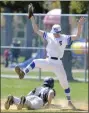  ?? PHOTO BY KYLE ADAMS ?? Saratoga Springs first baseman Luca Bonacio looks to avoid landing on Columbia base runner Carmen Erno after a snaring a high pick-off throw Thursday afternoon at East Side Rec.