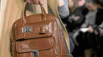 Tory Burch, Michael Kors want PH-made travel bags duty-free - PressReader