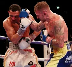  ??  ?? SUPREMACY REALISED: Hughes [far left] wades in but Ward proves he’s the better fighter over 12 rounds; Welborn [above right] shocks the touted Morrison, who cannot avoid the punishment coming his way. Despite calls to stop the contest, Morrsion...