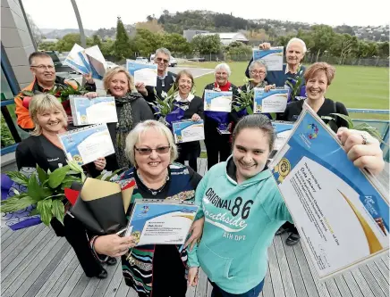  ?? MARTIN DE RUYTER/STUFF ?? Melodie Prescott, front left, and Bronwyn Taylor, front right, accepted the AgeConnect supreme champion award on behalf of Stoke Seniors at the Age Concernorg­anised awards event at the Trafalgar Park Pavilion. Other winners were, back from left,...