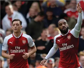  ??  ?? Anti-clockwise from the right: Arsenal will start Alexis Sanchez, Alexandre Lacazette and Mesut Ozil on their frontline together for the first time this season as manager Arsene Wenger looks to his top-three players to get the campaign righted